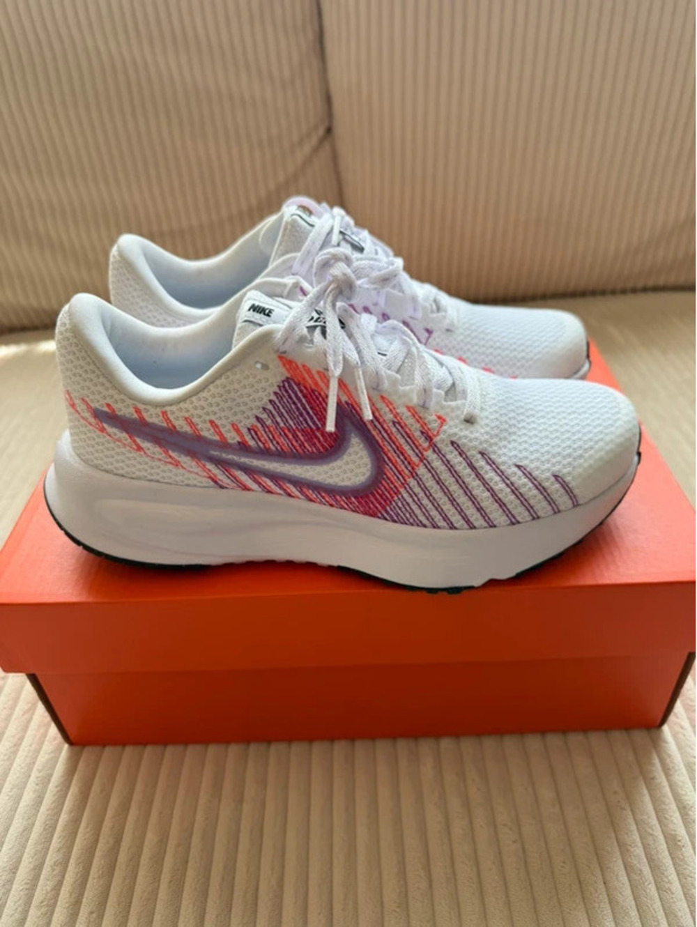 Women’s Nike Run Defy Sneakers